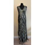 A 1930s sleeveless bias cut sequinned evening gown with plunge neckline. Measures from back of