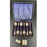 Set of six boxed silver teaspoons 1904 C W Fletcher & Son Ltd along with two napkin rings one
