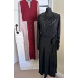 Two vintage dresses to include a 1940's black sequinned silk dress, (copper highlights and lurex