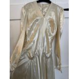 1930's cream satin wedding dress with pockets to the front and belt to the back, underarm to