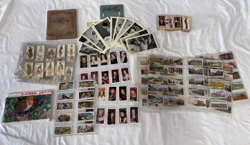 A quantity of cigarette cards to include Player's Characters from Dickins, King & Queens of England,