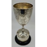 A silver trophy cup hallmarked London 1879, Henry Holland reading 'Tees-side show Lewis cup' on