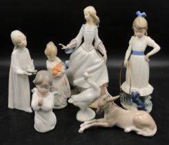 A collection of 7 Lladro figures comprising of Cinderella, Valencia Girl, My Dog Does Tricks Nao