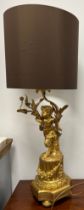 A good quality 19thC ormolu table lamp with cloven hoofed figure 80cm h to top of shade.