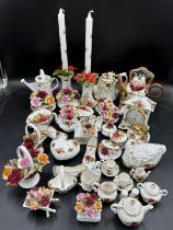 Royal Albert old country roses - a large quantity to include clock, pair of candlesticks, 10x flower