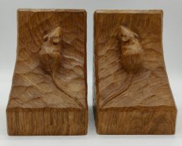 Robert 'Mouseman' Thompson a pair of Mouseman bookends, each with adzed surface and carved mouse