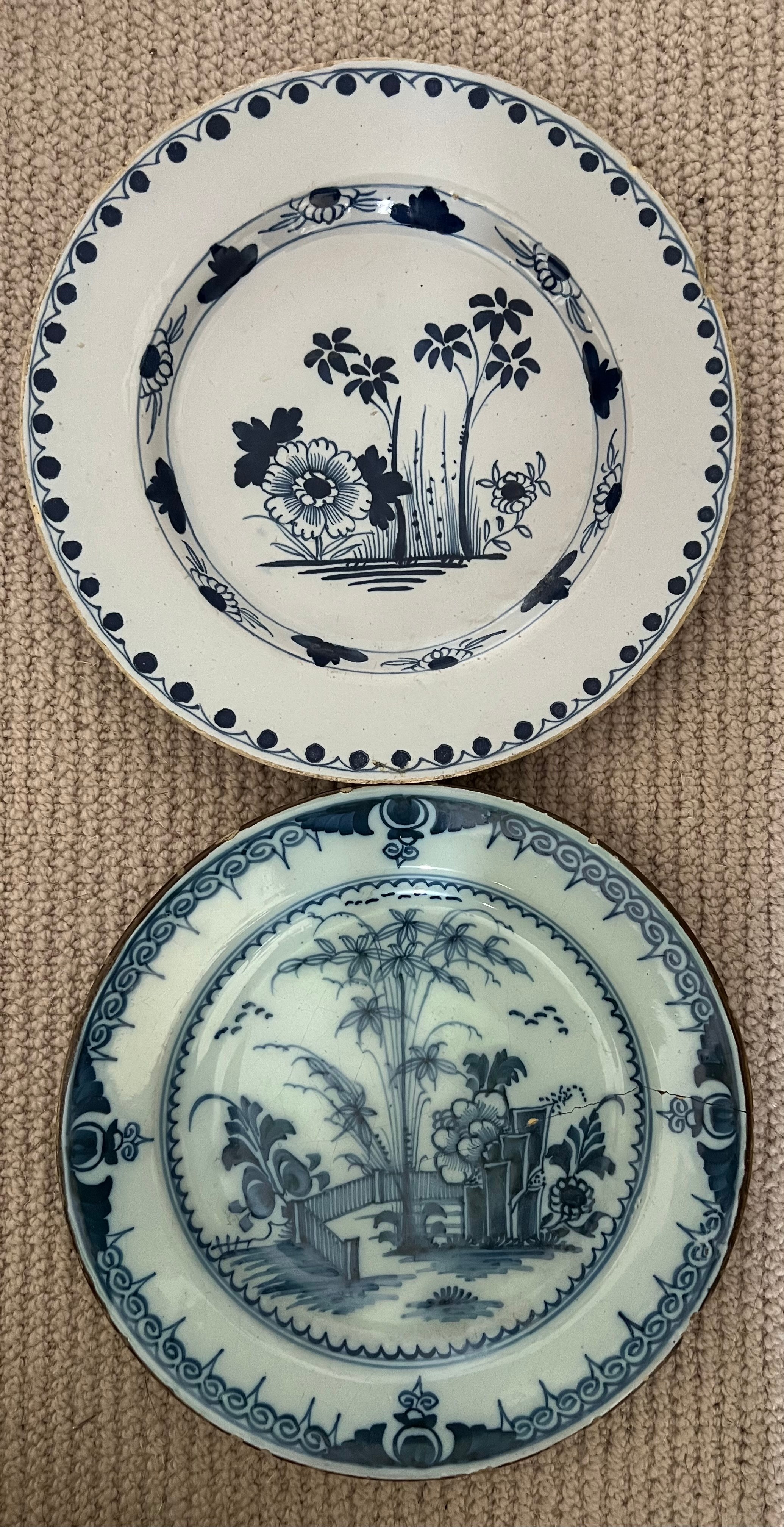 Two 18thC blue and white delft plates, largest 23.5cm d.