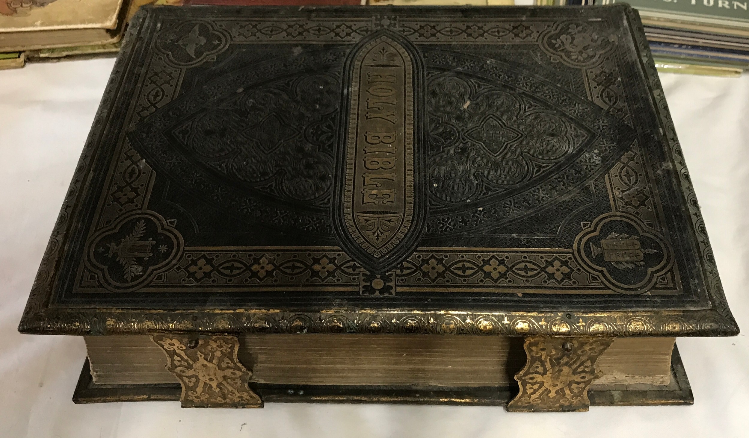 A collection of books to include, a brass bound holy Bible with metal closures and edging as well as - Image 11 of 11