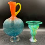 Two Kosta Boda vases tallest with handle 36.5cm h, smaller one 18.5cm. Label to both.