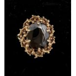 A 9 carat gold ring set with garnet. Size M, weight 5gm