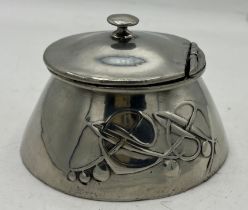 Archibald Knox Tudric polished pewter inkwell. 10cm x 10cm.