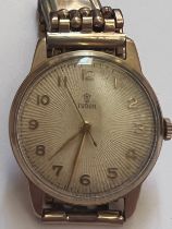 A 9ct gold Rolex Tudor hand winding wristwatch on gold plated bracelet, sunburst dial. In black box.
