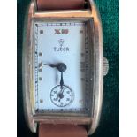 A Rolex Tudor gold plated, Art Deco, hand winding wristwatch on brown leather strap in green Rolex