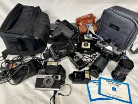 Cameras to include Olympus Trip 35, 2 x Kodak Brownie 127 cameras with cases, Sony video camera,