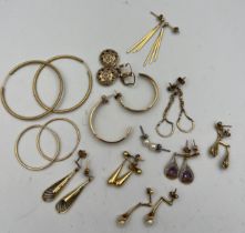 Twelve pairs of pierced earrings mainly 9 carat gold, others unmarked yellow metal, to include