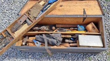 A vintage pine toolbox full of tools. 95cm w x 37cm d x 38cm h.