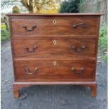 Mahogany chest of drawers with 3 graduating drawers and ivory escutcheons with original handles. 91w