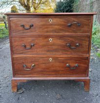 Mahogany chest of drawers with 3 graduating drawers and ivory escutcheons with original handles. 91w