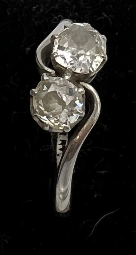 A platinum ring set with two diamonds in a crossover setting. Size P. Weight 3.6gm. - Image 4 of 4