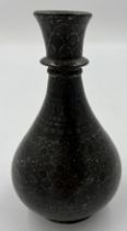 A 19thC Persian bronze and silver vase. 19cm h.