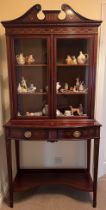 A good quality Edwardian mahogany and inlaid display cabinet with broken arch pediment. 91 x 42 d