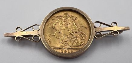 A George V 1913 full gold sovereign mounted in 9ct gold to form a brooch 11.23gm.
