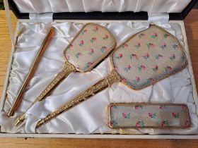 A boxed dressing table set together with certificate stating it was given for volunteering to appear