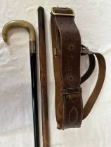 A WW1/WW2 British Sam Browne leather belt and an Officers swagger stick together with an ebony