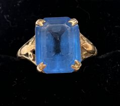 A 9 carat gold blue gem set ring, size M. Weight 2gm.