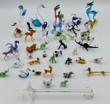 Collection of 52 miniature glass items, varying sizes, majority Murano, to include gondola,