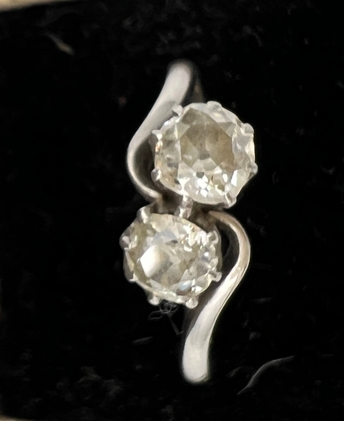 A platinum ring set with two diamonds in a crossover setting. Size P. Weight 3.6gm. - Image 2 of 4