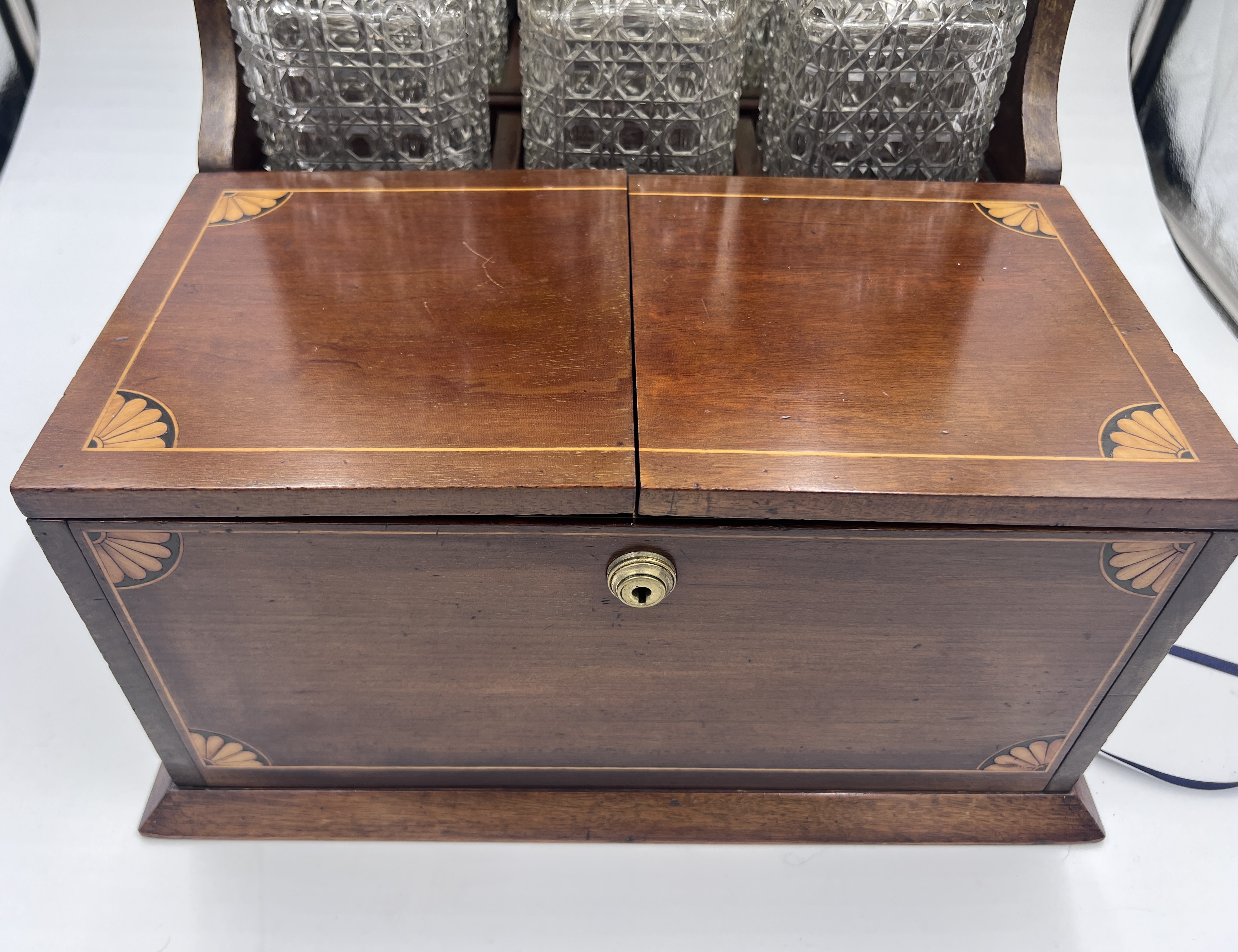 An Edwardian mahogany inlaid cut glass tantalus and games box containing cigar cutter, silver plated - Image 10 of 14