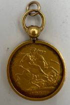 A Victorian full sovereign 1894 mounted in unmarked yellow metal. Total weight 11.6gm.