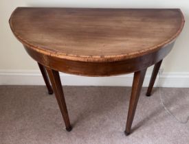 A fine quality 18thC demi lune table with good inlay and cross banding. 91 w x 45 d x 72cm h.