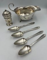 Hallmarked silver to include sauce boat Birmingham 1940, maker William Suckling Ltd. Four grapefruit