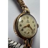 A vintage Tudor 9ct gold ladies wristwatch with subsidiary seconds dial on expanding gold plated