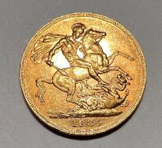 A Victorian full gold sovereign 1884, Melbourne mint mark.