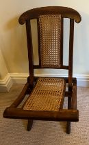 Two chairs to include a child’s vintage folding chair with cane back and seat. Height to back 62cm