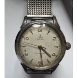 A 1950's Tudor Oyster stainless steel gentleman's wristwatch, gold numerals, gold hands and Rolex