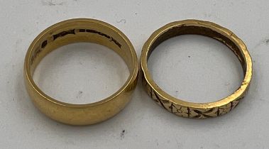 Two 18 carat gold wedding bands, one with decoration. Size N. Total weight 8.2gm.