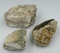 Mineral specimens to include two pieces of gypsum and a piece of calcite crystal/quartz. Total