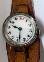 A vintage Numa manual wind trench watch on brown leather strap. Good working order.