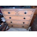 A 19thC pine chest of drawers, two long over three long drawers on bracket feet with original