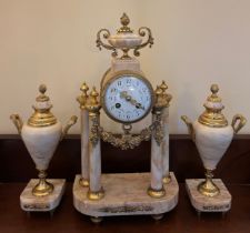 A late 19thC French marble and ormolu mounted clock garniture. Clock 43cm h.