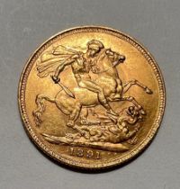 A Victorian full gold sovereign 1891, Melbourne mint mark.