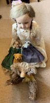 Dolls and teddies including late 19thC bisque headed doll in silk dress, wax headed doll and two