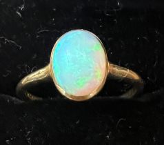 A 18 carat yellow gold ring set with opal. Weight 2.5gm. Size O.