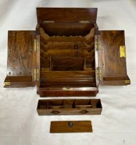 Victorian burr walnut writing box of sloping rectangular form with twin hinged doors, pull out pen