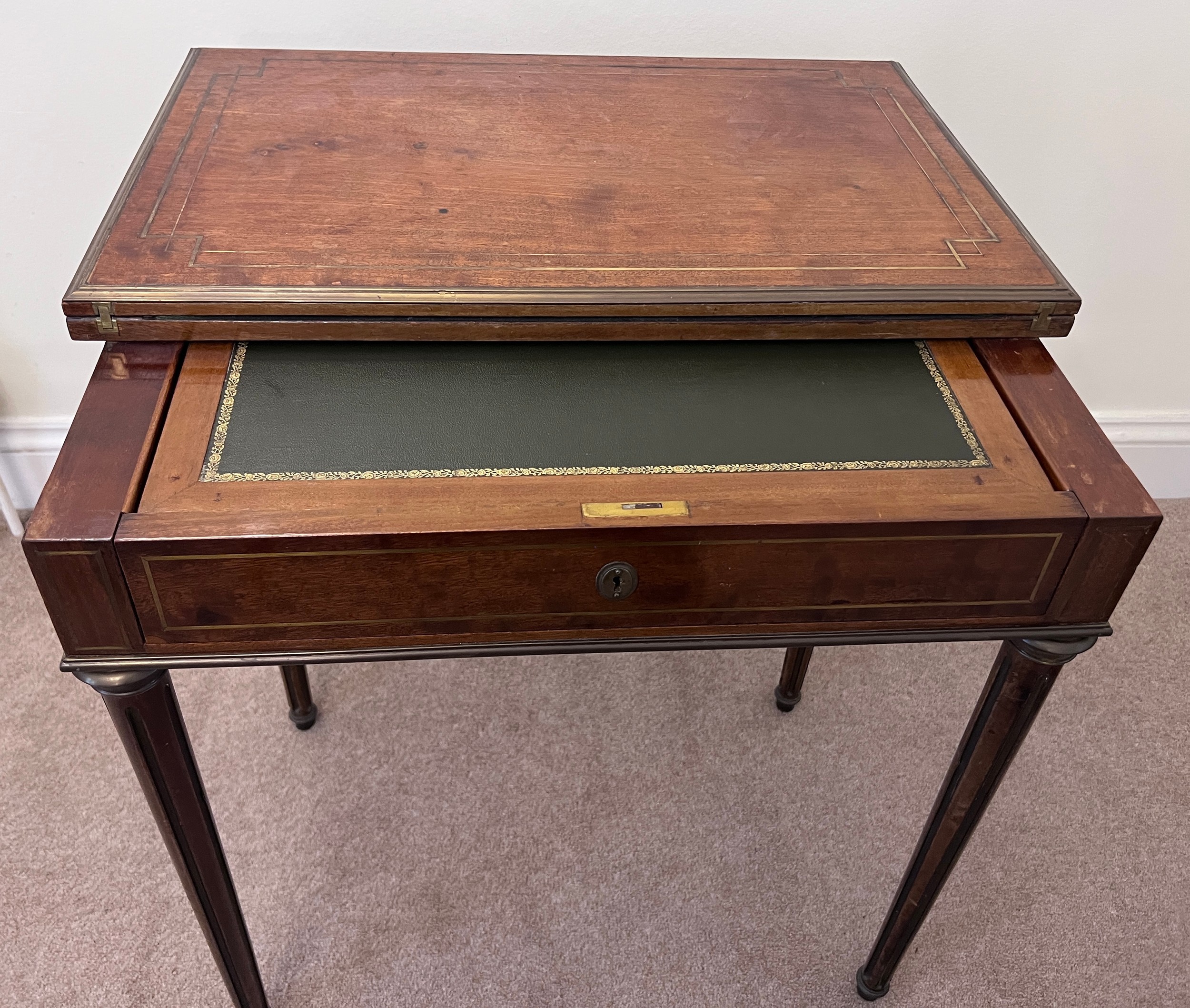 A metamorphic continental mahogany and brass inlaid dressing/card table. 71 x 45.5 x 75cm h. Open