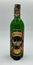 A bottle of Glenfiddich Pure Malt Scotch Whisky, over 8 years, Contents 26 2/3 Fl. ozs. Pre